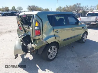 2011 Kia Soul + with VIN KNDJT2A21B7256665, listed as a IAAI auction lot 41741905 with 56,312 mi miles. Bid and sale history available at carsss.com. Image 4.