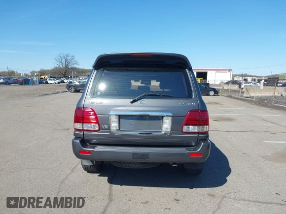 2003 Lexus LX with VIN JTJHT00W033531066, listed as a IAAI auction lot 41969617 with 209,710 mi miles. Bid and sale history available at carsss.com. Image 16.