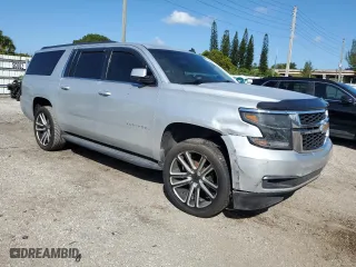 2015 Chevrolet Suburban LS with VIN 1GNSCHKC0FR142513, listed as a Copart auction lot 77311994 with 185,263 mi miles and Salvage Title. Bid and sale history available at carsss.com. Image 4.