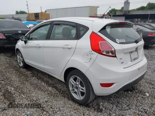 2017 Ford Fiesta SE z VIN 3FADP4EJ5HM117593, wystawiony jako IAAI lot #42212555 z przebiegiem 122 850 mil mil oraz . Historia ofert i sprzedaży dostępna na DreamBid. Obrazek 3.
