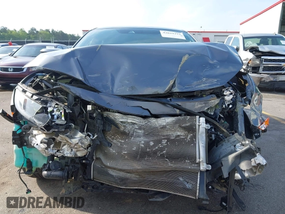 2021 Honda Civic Sport with VIN SHHFK7H44MU217741, listed as a IAAI auction lot 42029373 with 68,572 mi miles and . Bid and sale history available at DreamBid. Image 6.