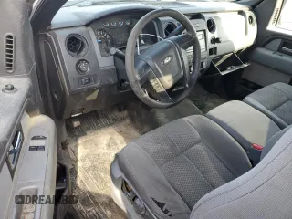 2014 Ford F-150 XL with VIN 1FTMF1CM2EKD70205, listed as a Copart auction lot 43963335 with 214,912 mi miles and Salvage title. Bid and sale history available at DreamBid. Image 8.