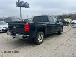 2014 Chevrolet Silverado 1500 LT with VIN 1GCVKREH1EZ169899, listed as a IAAI auction lot 42143501 with 124,789 mi miles and . Bid and sale history available at DreamBid. Image 4.