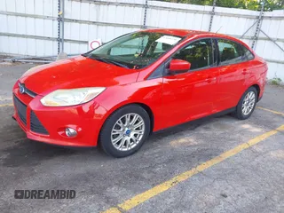 2012 Ford Focus SE with VIN 1FAHP3F24CL239326, listed as a IAAI auction lot 42668240 with 140,268 mi miles and . Bid and sale history available at DreamBid. Image 2.