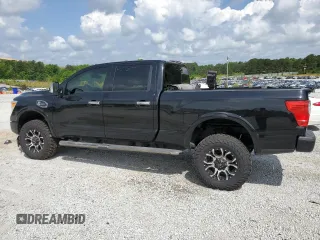 2016 Nissan Titan SL z VIN 1N6BA1F46GN513494, wystawiony jako Copart lot #55271185 z przebiegiem 97 890 mil mil oraz Tytuł czysty. Historia ofert i sprzedaży dostępna na DreamBid. Obrazek 2.