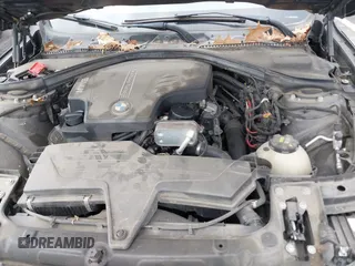 2015 BMW 3 Series 320i with VIN WBA3B1G57FNT05826, listed as a IAAI auction lot 42103193 with 128,800 mi miles. Bid and sale history available at carsss.com. Image 10.