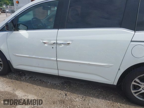 2011 Honda Odyssey EX-L with VIN 5FNRL5H60BB026171, listed as a IAAI auction lot 42511296 with 288,827 mi miles and . Bid and sale history available at DreamBid. Image 21.