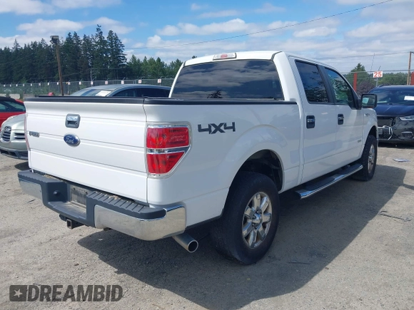 2014 Ford F-150 XL with VIN 1FTFW1ETXEFD14681, listed as a IAAI auction lot 42650184 with 133,873 mi miles and . Bid and sale history available at DreamBid. Image 4.