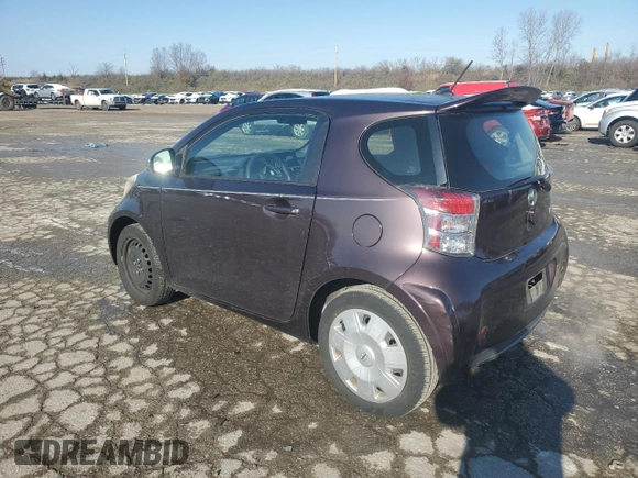 2012 Scion iQ z VIN JTNJJXB00CJ014966, wystawiony jako Copart lot #83100954 z przebiegiem 100 775 mil mil oraz Szkoda całkowita • Salvage title. Historia ofert i sprzedaży dostępna na DreamBid. Obrazek 2.