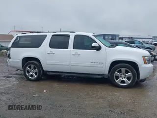 2014 Chevrolet Suburban LT with VIN 1GNSCJE06ER154639, listed as a IAAI auction lot 41410623 with 213,592 mi miles. Bid and sale history available at carsss.com. Image 13.