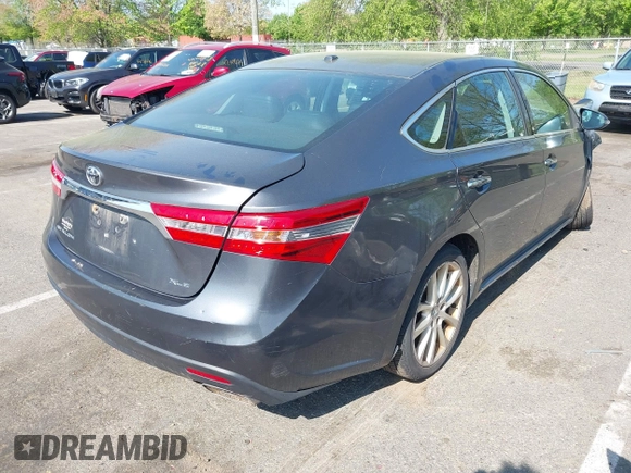 2013 Toyota Avalon XLE with VIN 4T1BK1EB2DU005939, listed as a IAAI auction lot 42172970 with 248,580 mi miles and . Bid and sale history available at DreamBid. Image 4.