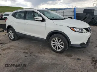 2017 Nissan Rogue SV with VIN JN1BJ1CP5HW010989, listed as a Copart auction lot 59119805 with 82,632 mi miles and Salvage title. Bid and sale history available at DreamBid. Image 4.