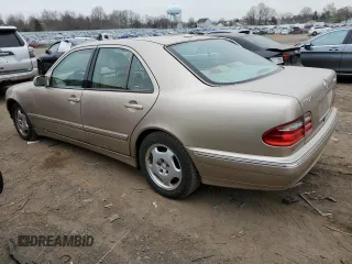 2002 Mercedes-Benz E-Class with VIN WDBJF82J52X062915, listed as a Copart auction lot 48284604 with 150,227 mi miles and Salvage Title. Bid and sale history available at carsss.com. Image 2.