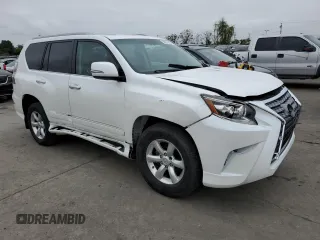 2014 Lexus GX 460 with VIN JTJBM7FX2E5079088, listed as a Copart auction lot 56070915 with 129,822 mi miles and Salvage Title. Bid and sale history available at DreamBid. Image 4.