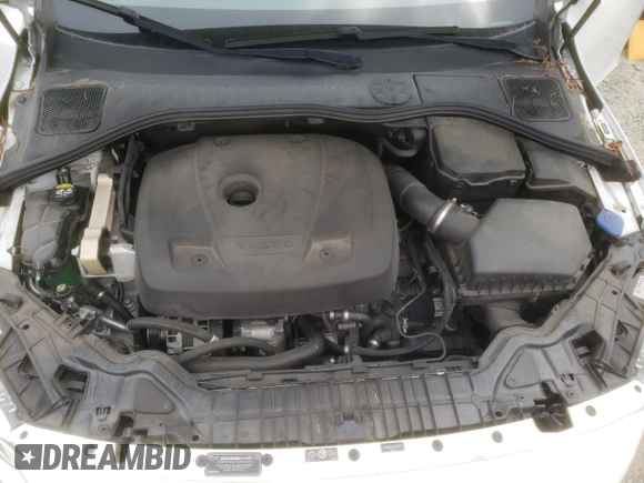 2018 Volvo V60 z VIN YV440MWK1J2051771, wystawiony jako Copart lot #67960674 z przebiegiem 49 782 mil mil oraz Szkoda całkowita • Salvage title. Historia ofert i sprzedaży dostępna na DreamBid. Obrazek 11.