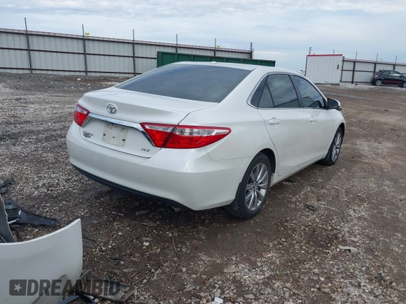 2015 Toyota Camry XLE with VIN 4T1BF1FK1FU083814, listed as a IAAI auction lot 41356310 with 161,671 mi miles and . Bid and sale history available at DreamBid. Image 4.
