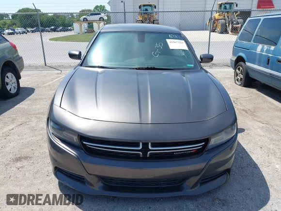 2015 Dodge Charger SE z VIN 2C3CDXBGXFH751491, wystawiony jako IAAI lot #41907243 z przebiegiem 112 545 mil mil oraz . Historia ofert i sprzedaży dostępna na DreamBid. Obrazek 12.
