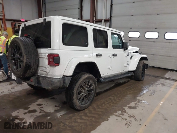 2021 Jeep Wrangler Unlimited Sahara with VIN 1C4JJXP60MW830307, listed as a IAAI auction lot 41869863 with 37,201 mi miles and . Bid and sale history available at DreamBid. Image 4.