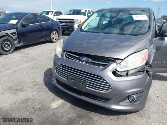 2014 Ford C-Max Hybrid SEL with VIN 1FADP5BU2EL507925, listed as a IAAI auction lot 41817702 with 137,490 mi miles. Bid and sale history available at carsss.com. Image 6.