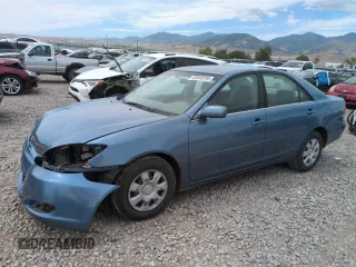 2004 Toyota Camry LE with VIN JTDBE32K640277641, listed as a Copart auction lot 62643295 with 152,997 mi miles and Salvage title. Bid and sale history available at DreamBid. Image 1.