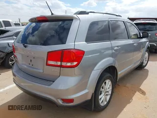 2018 Dodge Journey SXT z VIN 3C4PDCBB0JT361784, wystawiony jako IAAI lot #42172506 z przebiegiem 135 273 mil mil oraz . Historia ofert i sprzedaży dostępna na DreamBid. Obrazek 4.