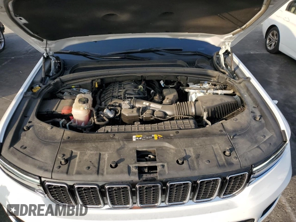 2023 Jeep Grand Cherokee Overland with VIN 1C4RJHDG8PC502208, listed as a Copart auction lot 86927734 with 53,732 mi miles and Salvage title. Bid and sale history available at DreamBid. Image 12.