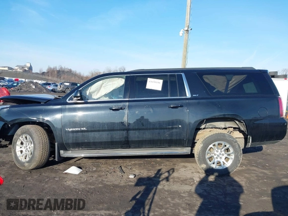 2015 GMC Yukon XL SLT with VIN 1GKS2HKC8FR154330, listed as a IAAI auction lot 41650106 with 268,056 mi miles. Bid and sale history available at carsss.com. Image 14.