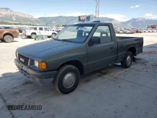 1994 Isuzu Pickup S z VIN JAACL11L2R7221226, wystawiony jako Copart lot #59027295 z przebiegiem 129 494 mil mil oraz Tytuł czysty. Historia ofert i sprzedaży dostępna na DreamBid. Obrazek 1.