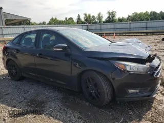 2016 Ford Focus SE with VIN 1FADP3F21GL228871, listed as a Copart auction lot 63506525 with 62,756 mi miles and Salvage title. Bid and sale history available at DreamBid. Image 4.