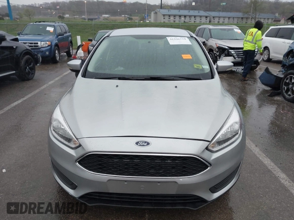 2017 Ford Focus SE with VIN 1FADP3F24HL303600, listed as a IAAI auction lot 41948159 with 95,212 mi miles and . Bid and sale history available at DreamBid. Image 13.