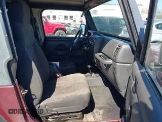 2003 Jeep Wrangler Sport with VIN 1J4FA49S33P345192, listed as a IAAI auction lot 41801344 with 196,472 mi miles. Bid and sale history available at carsss.com. Image 5.