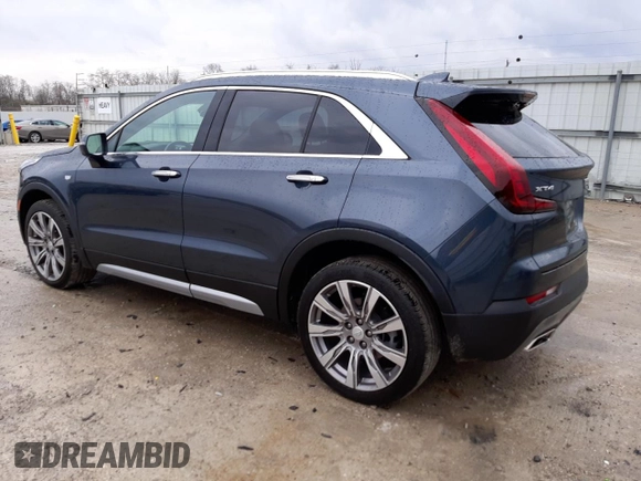2021 Cadillac XT4 FWD Premium Luxury with VIN 1GYFZCR43MF001003, listed as a Copart auction lot 67527962 with 30,230 mi miles. Bid and sale history available at carsss.com. Image 2.