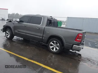 2021 Ram 1500 Limited with VIN 1C6SRFHT4MN588369, listed as a IAAI auction lot 41553981 with 51,293 mi miles and . Bid and sale history available at DreamBid. Image 3.