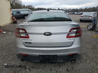 2014 Ford Taurus SE with VIN 1FAHP2D87EG164232, listed as a Copart auction lot 83407024 with 156,348 mi miles and Salvage Title. Bid and sale history available at DreamBid. Image 6.