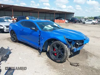 2024 Chevrolet Camaro 1LT z VIN 1G1FB1RS7R0122889, wystawiony jako IAAI lot #42206357 z przebiegiem 7 808 mil mil oraz . Historia ofert i sprzedaży dostępna na DreamBid. Obrazek 1.