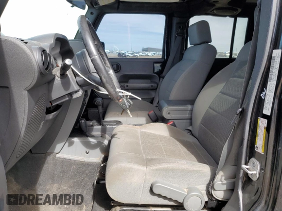 2008 Jeep Wrangler Unlimited Rubicon with VIN 1J4GA69108L501632, listed as a Copart auction lot 48742355 with 156,766 mi miles and Salvage Title. Bid and sale history available at carsss.com. Image 7.