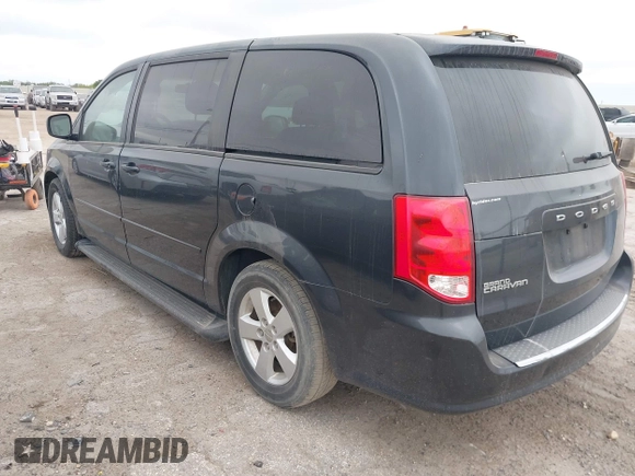2013 Dodge Grand Caravan SE with VIN 2C4RDGBG0DR641272, listed as a IAAI auction lot 42046978 with 159,342 mi miles and . Bid and sale history available at DreamBid. Image 3.