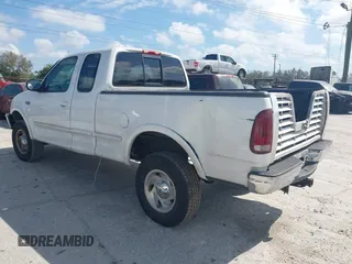 1997 Ford F-150 XL with VIN 1FTDX1868VKA12923, listed as a IAAI auction lot 41526986 with 343,755 mi miles. Bid and sale history available at carsss.com. Image 3.