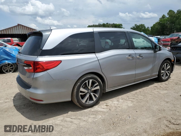 2022 Honda Odyssey Touring с VIN 5FNRL6H82NB009321, выставлен на аукционе Copart как лот 59058535 с пробегом 88 073 миль миль и Списание • Salvage title. История ставок и продаж доступна на DreamBid. Изображение 3.