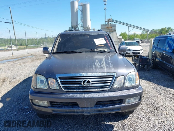 2003 Lexus LX with VIN JTJHT00W233532297, listed as a IAAI auction lot 42189676 with 235,992 mi miles. Bid and sale history available at carsss.com. Image 12.