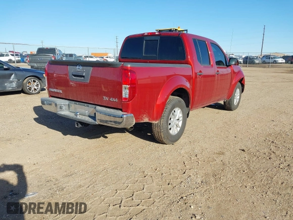 2015 Nissan Frontier SV with VIN 1N6AD0EV9FN700301, listed as a IAAI auction lot 41771088 with 136,749 mi miles and . Bid and sale history available at DreamBid. Image 4.