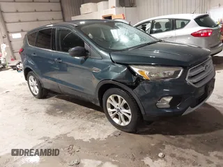 2019 Ford Escape SE z VIN 1FMCU9GDXKUA54699, wystawiony jako IAAI lot #41667188 z przebiegiem 127 376 mil mil oraz . Historia ofert i sprzedaży dostępna na DreamBid. Obrazek 1.