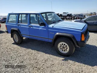 1996 Jeep Cherokee SE with VIN 1J4FT28S1TL108840, listed as a Copart auction lot 46951195 with 257,004 mi miles and Salvage Title. Bid and sale history available at carsss.com. Image 4.