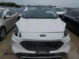 2022 Ford Escape Titanium z VIN 1FMCU9J91NUB93886, wystawiony jako Copart lot #69189524 z przebiegiem Nie podano mil oraz Czysty tytuł • Clean title. Historia ofert i sprzedaży dostępna na DreamBid. Obrazek 5.