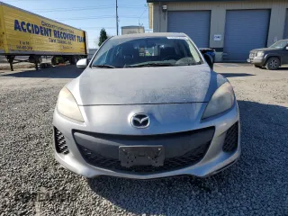 2013 Mazda 3 i Touring z VIN JM1BL1LP7D1841036, wystawiony jako Copart lot #53365045 z przebiegiem 166 539 mil mil oraz Szkoda całkowita • Salvage title. Historia ofert i sprzedaży dostępna na DreamBid. Obrazek 5.
