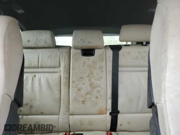 2012 BMW X5 35i z VIN 5UXZV4C5XCL748652, wystawiony jako Copart lot #55457455 z przebiegiem 149 030 mil mil oraz Szkoda całkowita • Salvage title. Historia ofert i sprzedaży dostępna na DreamBid. Obrazek 10.