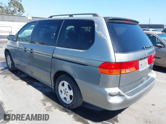 2001 Honda Odyssey EX z VIN 2HKRL18641H504729, wystawiony jako IAAI lot #42337944 z przebiegiem 203 356 mil mil oraz . Historia ofert i sprzedaży dostępna na DreamBid. Obrazek 6.