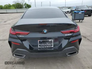 2022 BMW 8 Series 840i z VIN WBAGV4C01NCH18603, wystawiony jako Copart lot #51969445 z przebiegiem 19 502 mil mil oraz Tytuł czysty. Historia ofert i sprzedaży dostępna na DreamBid. Obrazek 6.