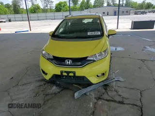 2015 Honda Fit EX-L z VIN 3HGGK5H8XFM765160, wystawiony jako Copart lot #55809025 z przebiegiem 77 631 mil mil oraz Szkoda całkowita • Salvage title. Historia ofert i sprzedaży dostępna na DreamBid. Obrazek 13.
