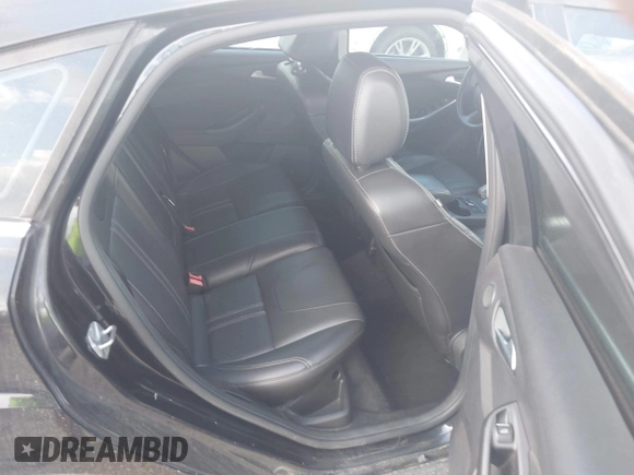 2014 Ford Focus Titanium z VIN 1FADP3N28EL208034, wystawiony jako IAAI lot #42426943 z przebiegiem 220 891 mil mil oraz . Historia ofert i sprzedaży dostępna na DreamBid. Obrazek 8.